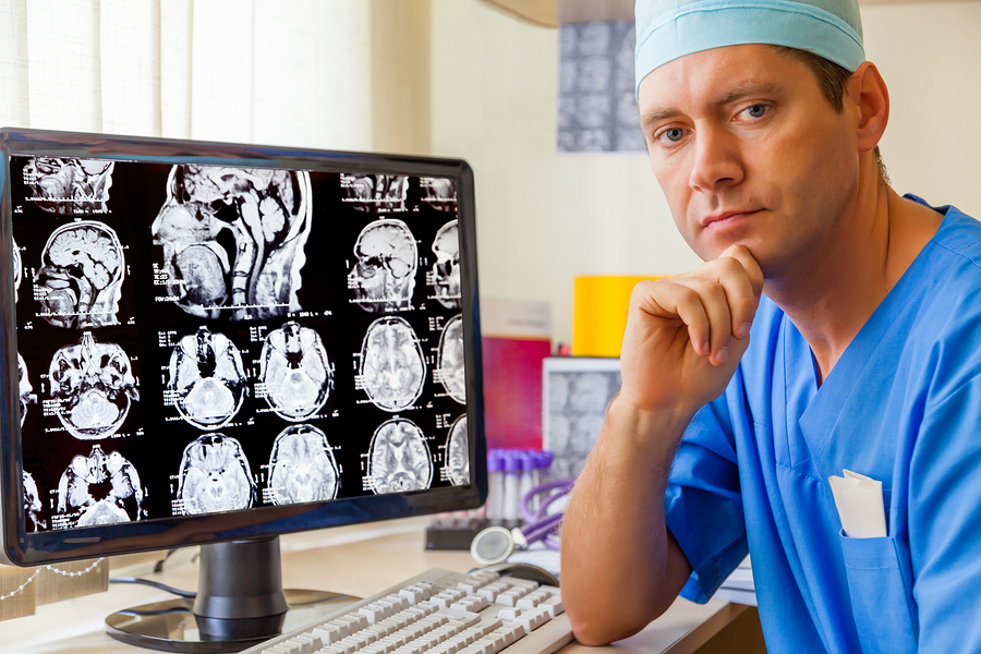 bigstock-Experienced-doctor-with-an-MRI-45421879