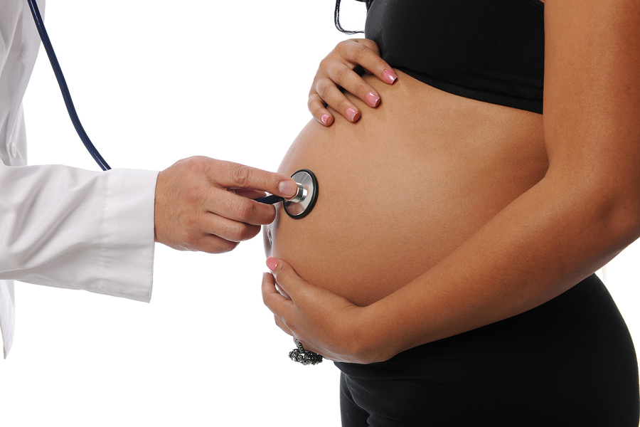 bigstock-Pregnant-woman-being-examine-b-19161065